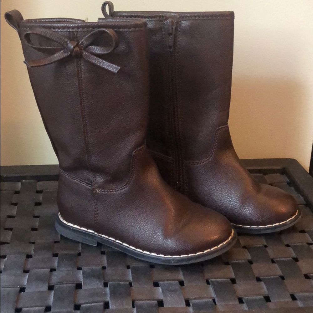 Tall brown boots with bow detail